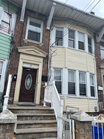a view of a house with a door and a fireplace