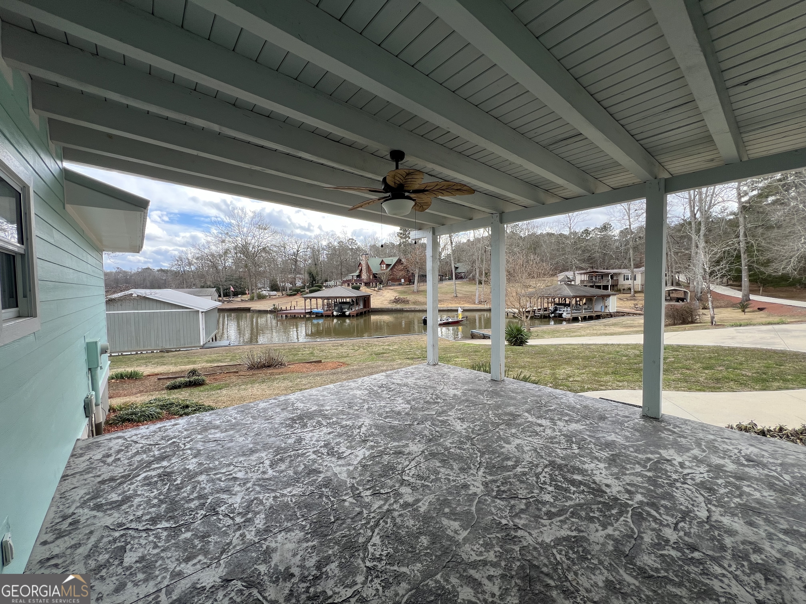 166 Montego Bay Road Northwest Milledgeville, GA 31061 - Photo 26 of 42 a view of a backyard of a house