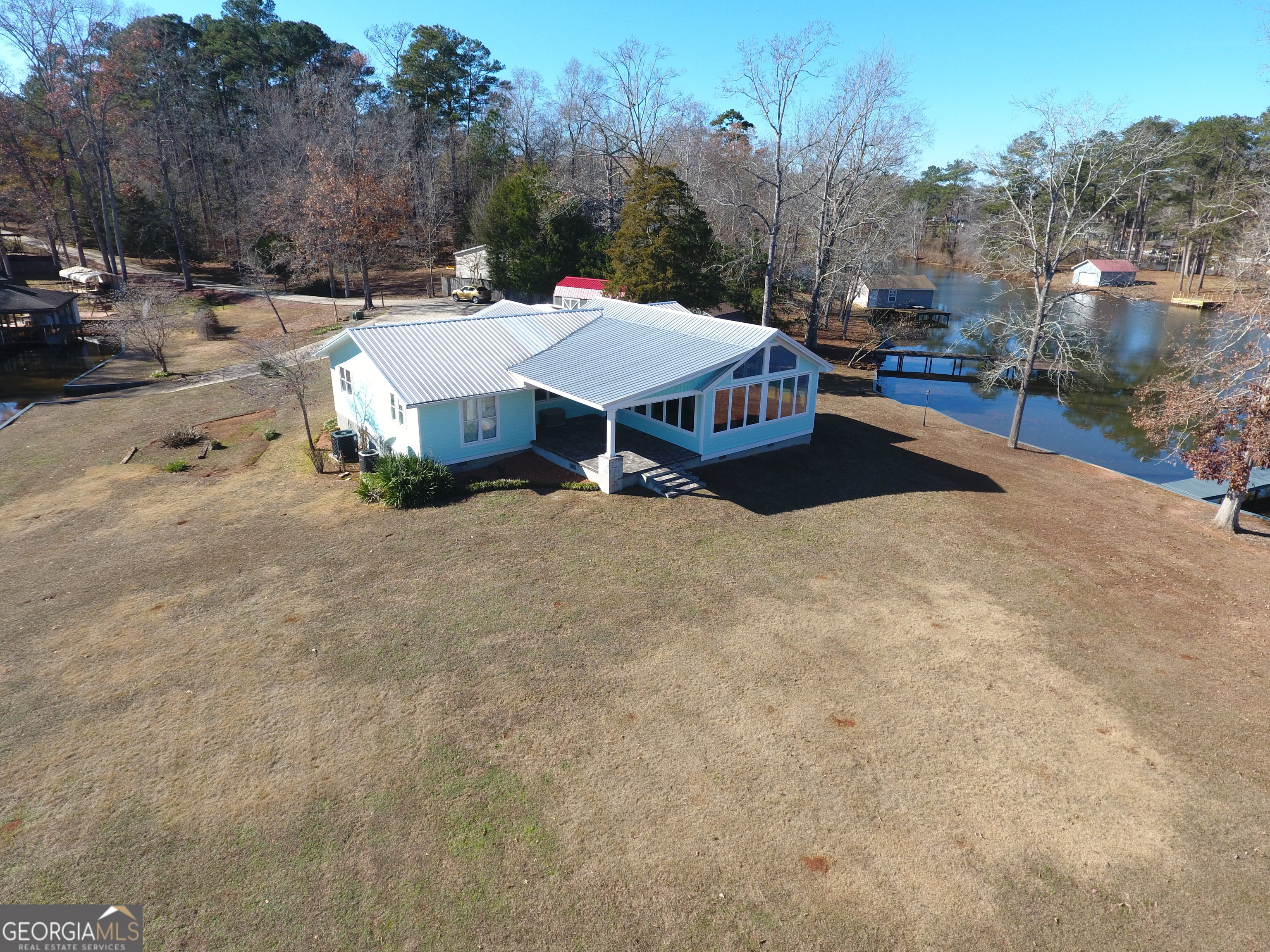 166 Montego Bay Road Northwest Milledgeville, GA 31061 - Photo 40 of 42 a small pool with a bench