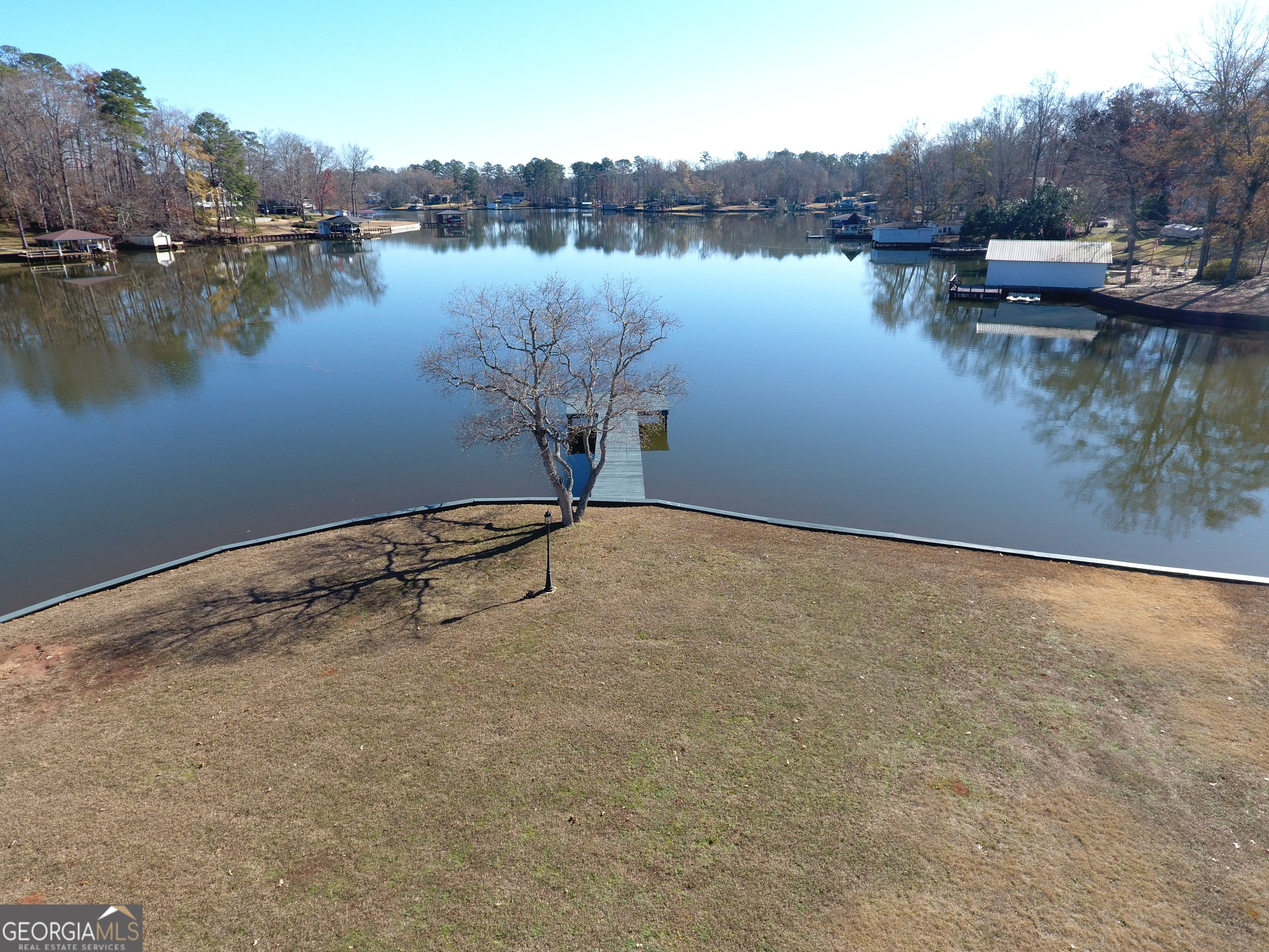 166 Montego Bay Road Northwest Milledgeville, GA 31061 - Photo 41 of 42 a view of a lake with houses