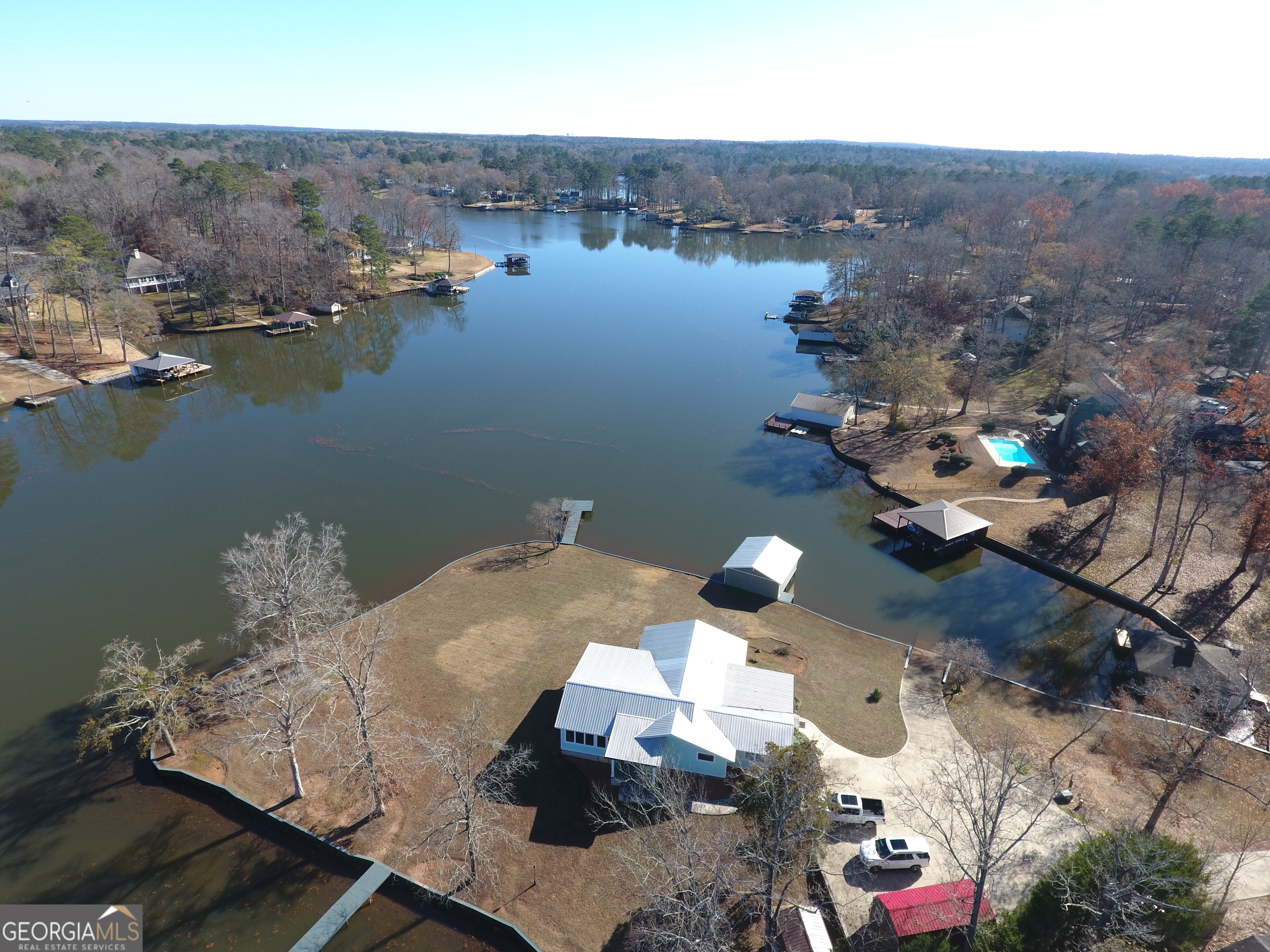 166 Montego Bay Road Northwest Milledgeville, GA 31061 - Photo 42 of 42 an aerial view of a house with a lake view