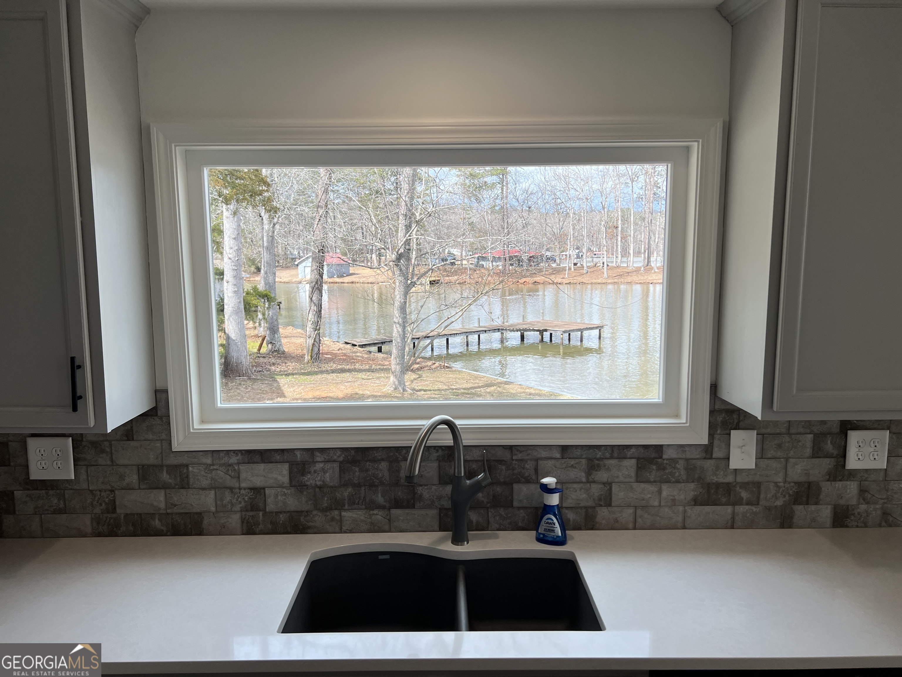 166 Montego Bay Road Northwest Milledgeville, GA 31061 - Photo 8 of 42 a kitchen with a sink and a window