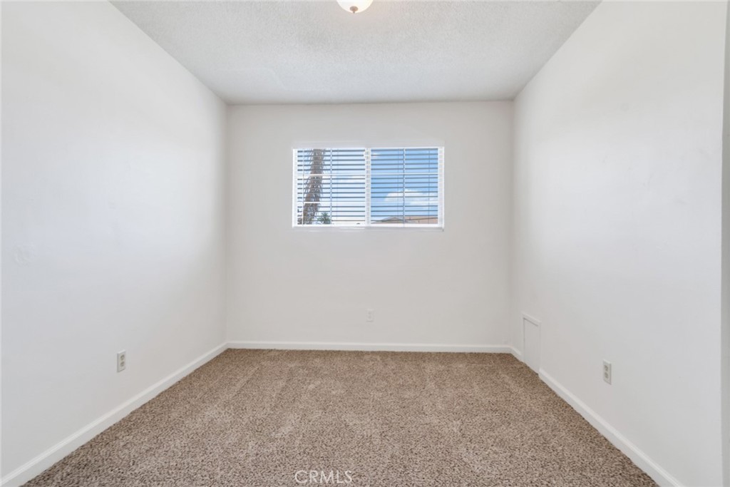 8955 Holly Lane Riverside, CA 92503 - Photo 19 of 32 an empty room with a window