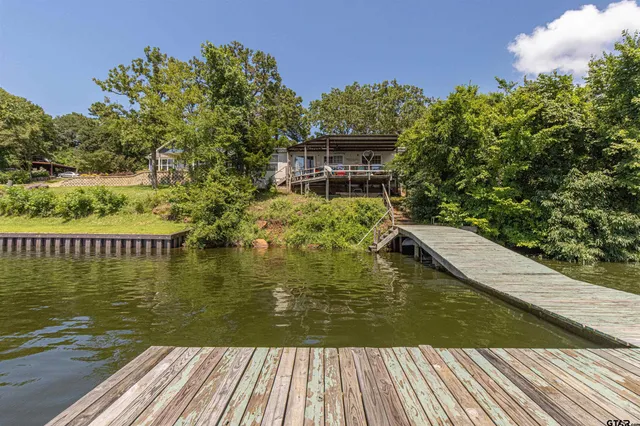 a view of a lake in middle of the house