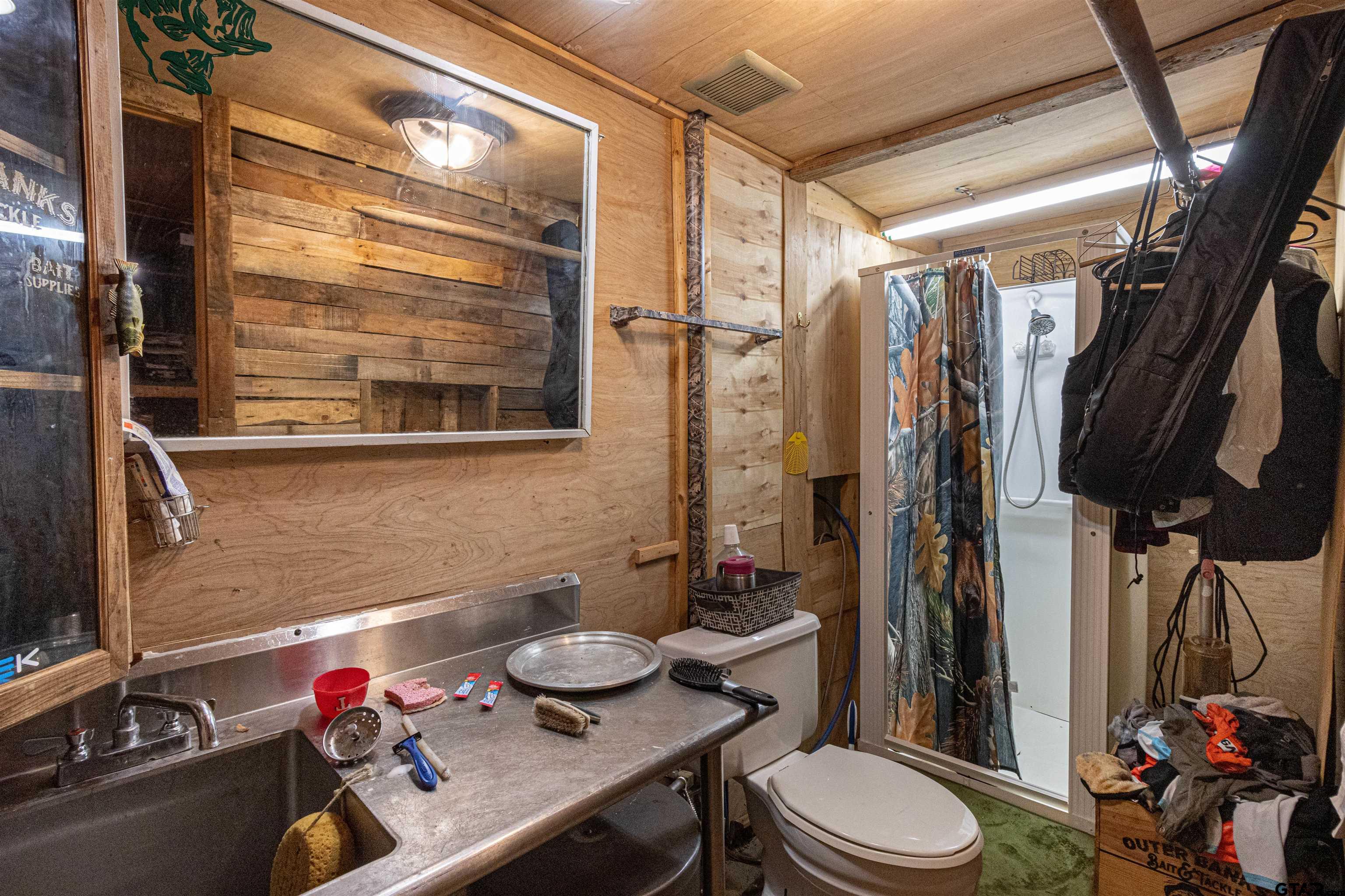 489 Martha Street Bullard, TX 75757 - Photo 39 of 44 a bathroom with a sink toilet and shower