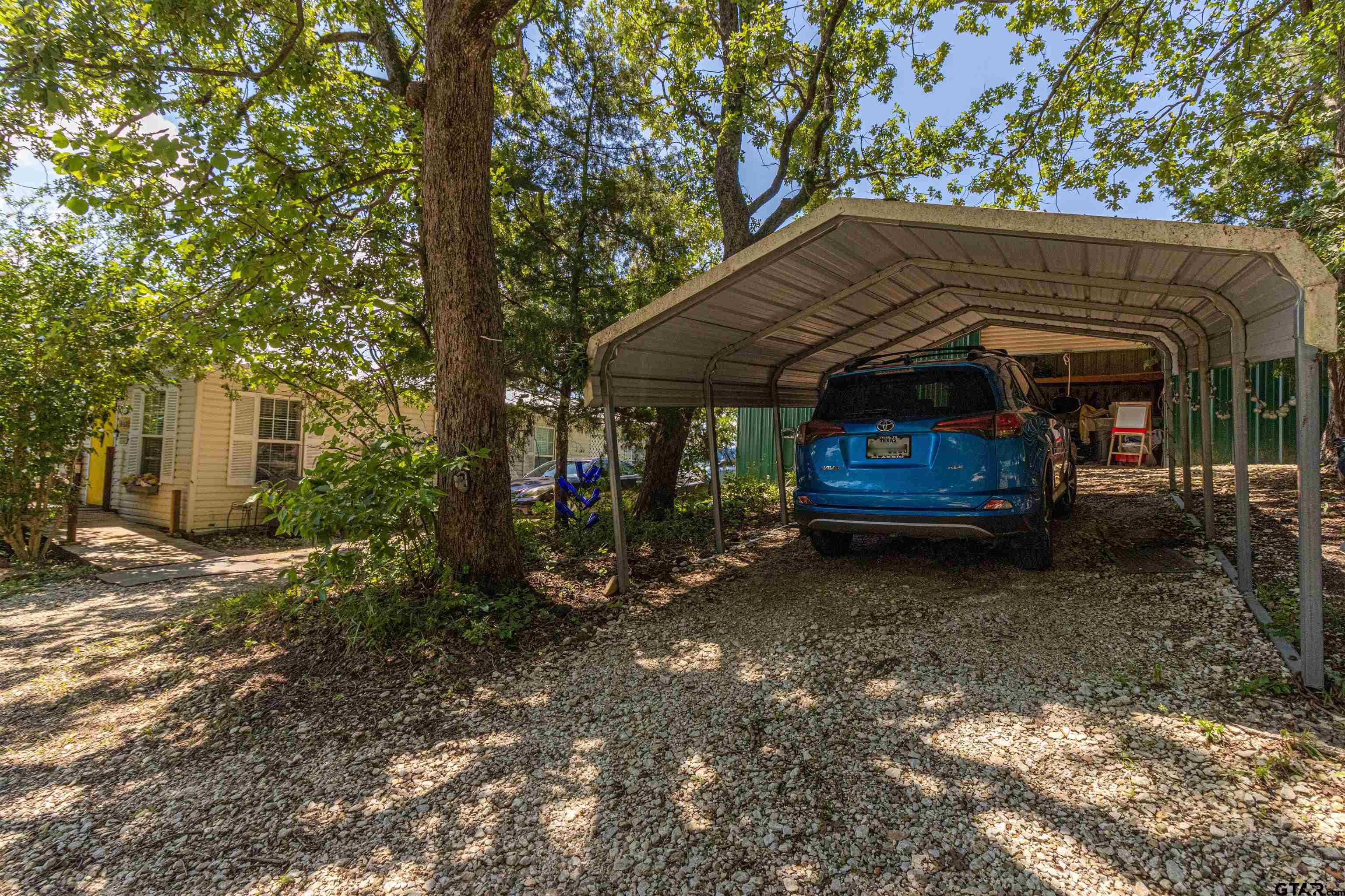 489 Martha Street Bullard, TX 75757 - Photo 41 of 44 a view of a car park in front of a house
