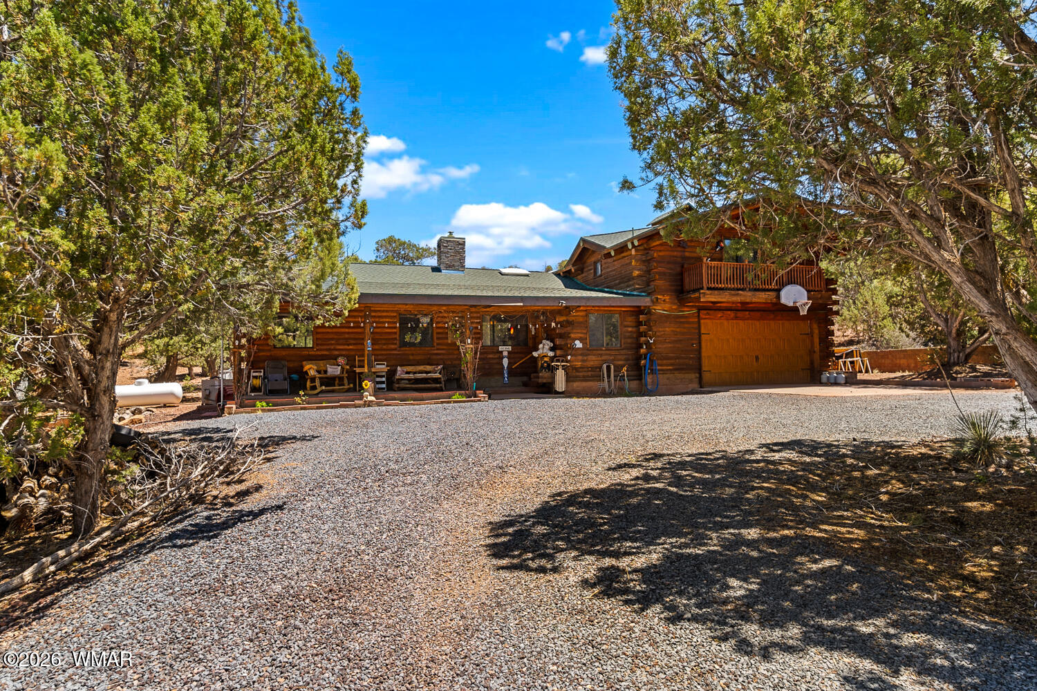 6720 Cheney Ranch Loop Show Low, AZ 85901 - Photo 47 of 55 a front view of a house with a yard