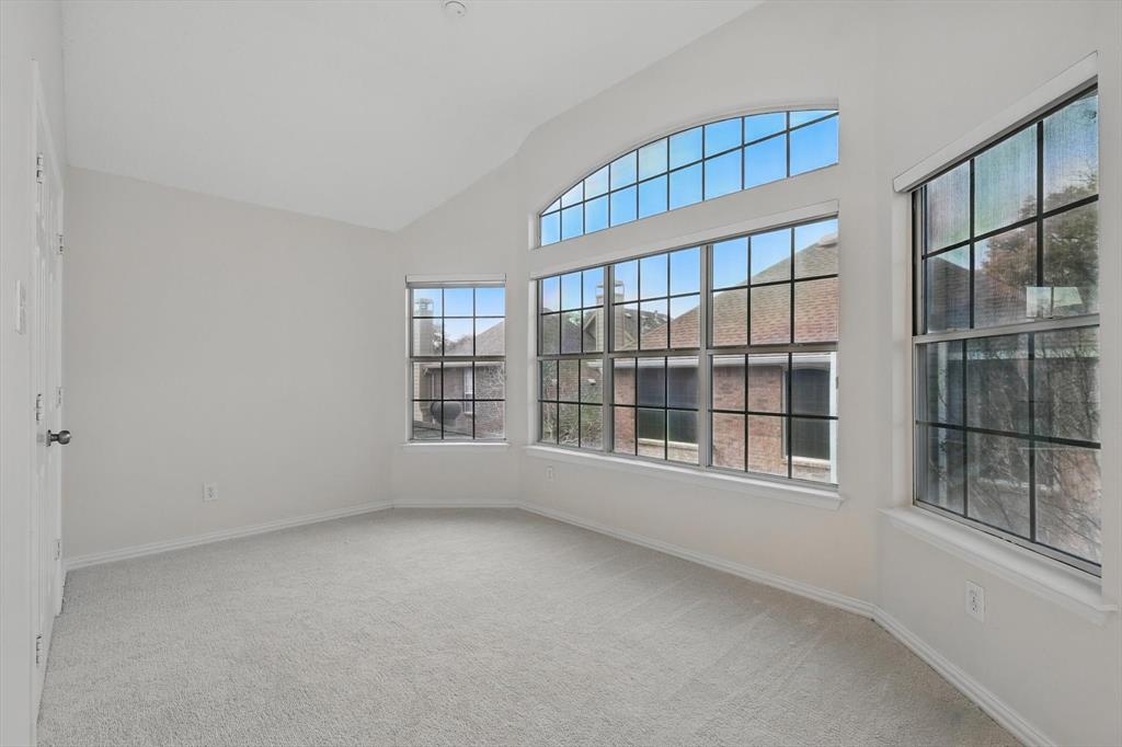 14625 Windsor Court Addison, TX 75001 - Photo 22 of 40 a view of an empty room with a window