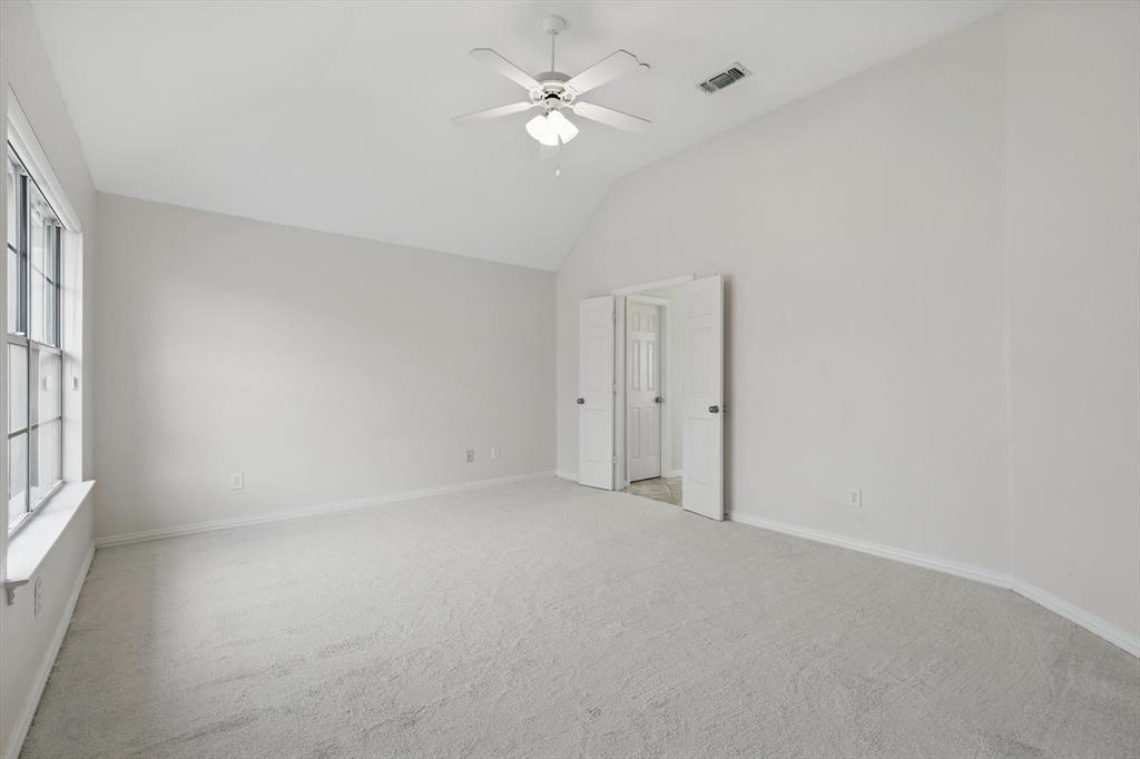 14625 Windsor Court Addison, TX 75001 - Photo 23 of 40 wooden floor in an empty room with a window