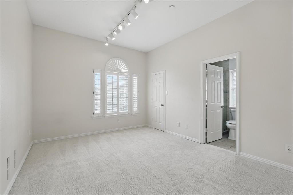 14625 Windsor Court Addison, TX 75001 - Photo 32 of 40 wooden floor in an empty room with a window