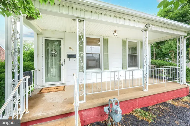 a view of a balcony with a potted plant
