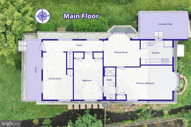 an aerial view of a multi story residential apartment building with yard