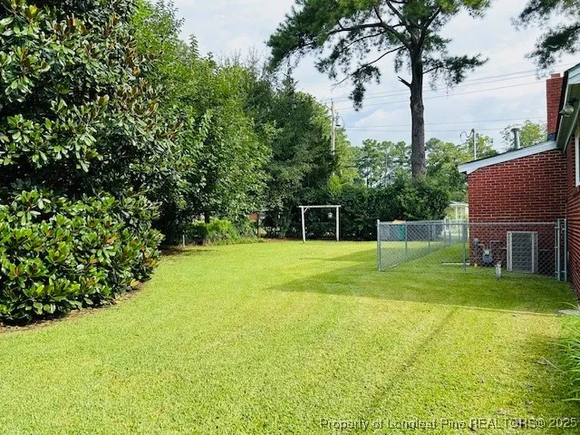 a view of a backyard with a garden