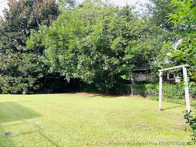 a view of outdoor space and swimming pool