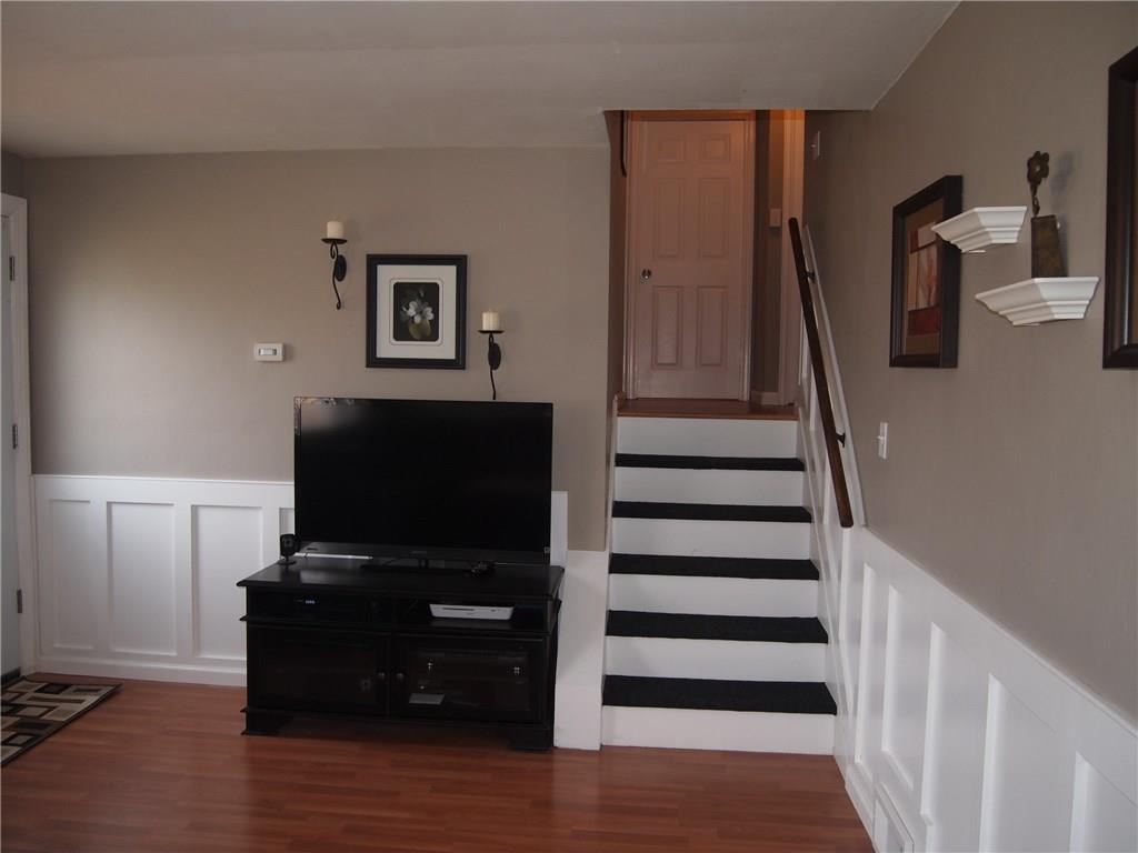 936 Lindsay Road Carnegie, PA 15106 - Photo 9 of 25 Continuing upstairs another view of the wainscoting and stairs to bedrooms. Also note all new insulation throughout the first floor.