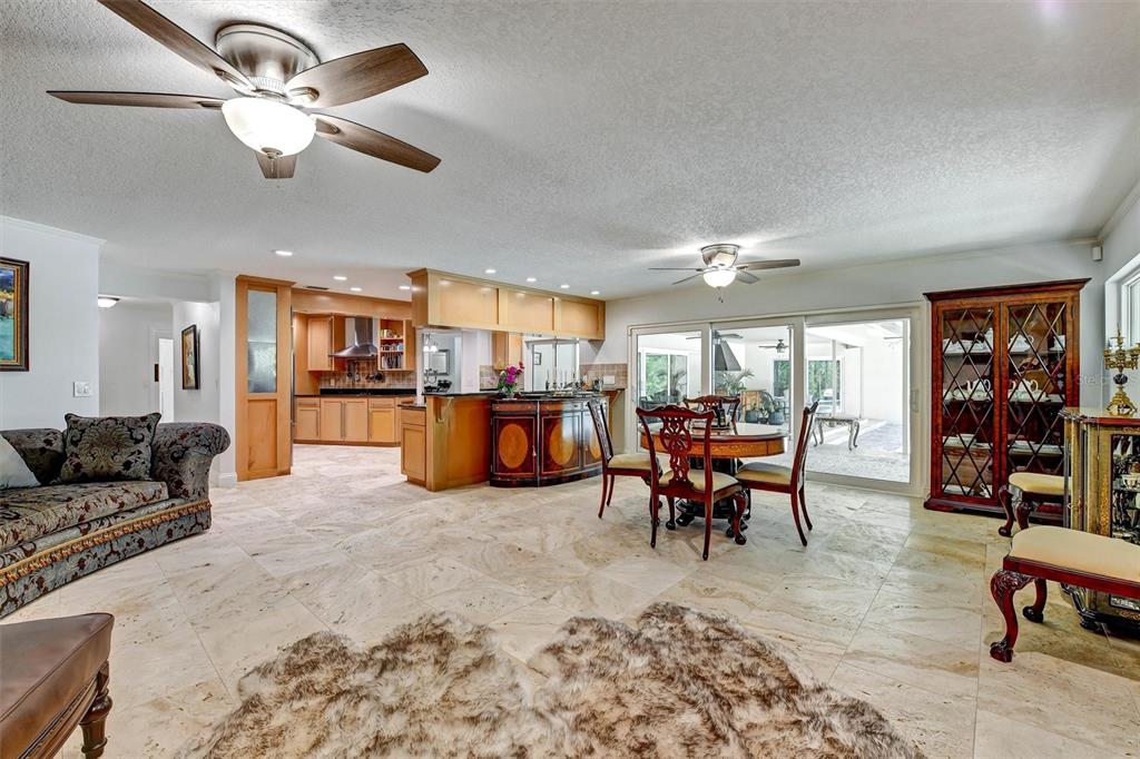 1875 Belleair Road Clearwater, FL 33764 - Photo 28 of 100 a living room with furniture and kitchen view