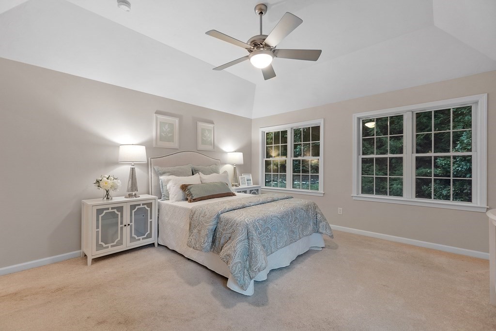 3 Reed Lane, Unit 3 Littleton, MA 01460 - Photo 11 of 29 a bed room with a bed and a large window
