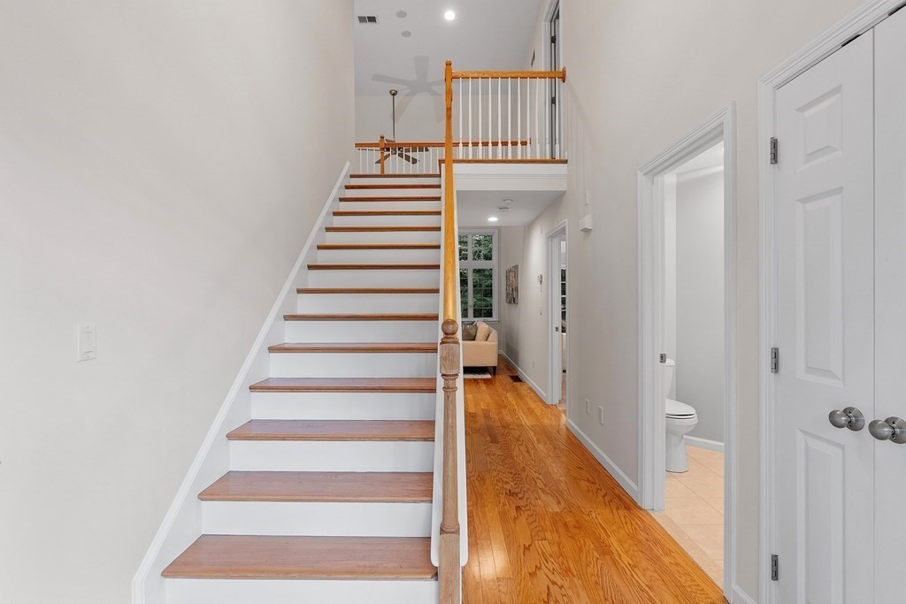 3 Reed Lane, Unit 3 Littleton, MA 01460 - Photo 16 of 29 a view of entryway and hall with wooden floor