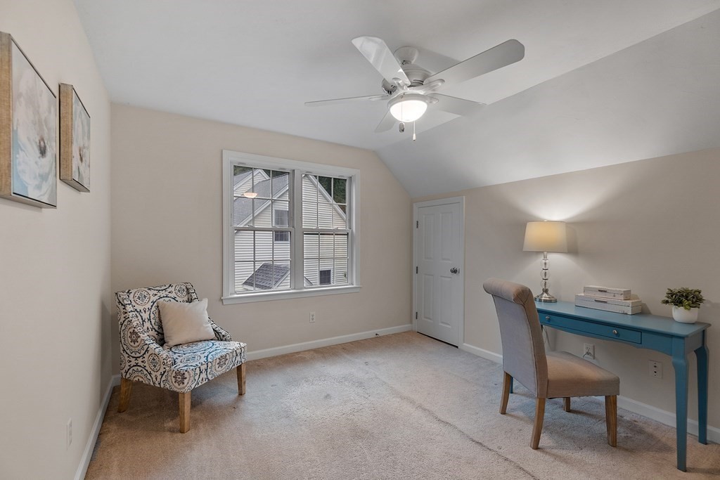 3 Reed Lane, Unit 3 Littleton, MA 01460 - Photo 20 of 29 a living room with furniture and a window
