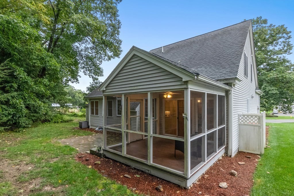 3 Reed Lane, Unit 3 Littleton, MA 01460 - Photo 2 of 29 a view of a house with a yard