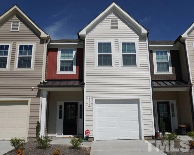 4413 Lord Joseph Court Raleigh, NC 27610 - Photo 1 of 4 a front view of a house