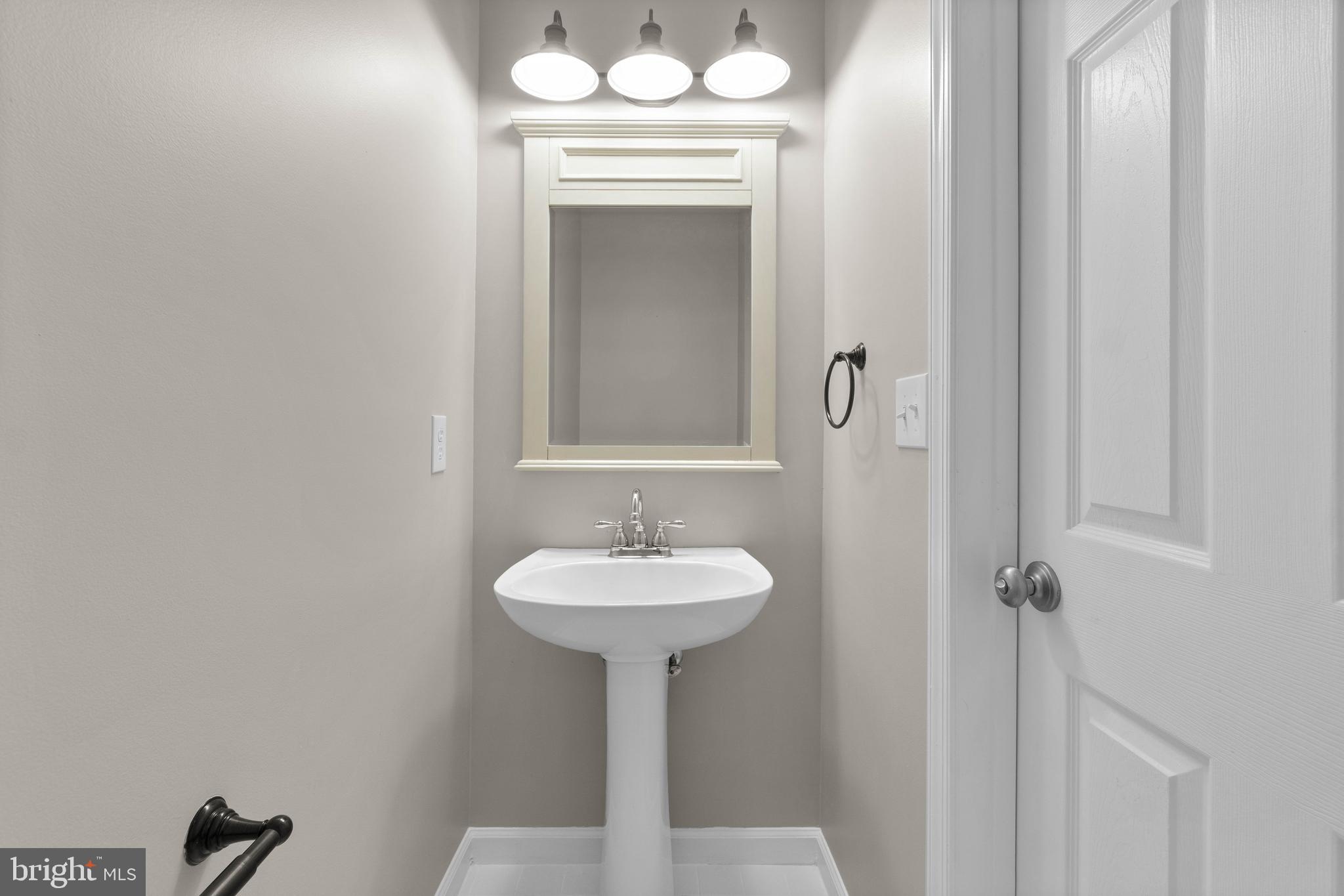 1202 Ripple Court Pasadena, MD 21122 - Photo 27 of 56 Main Level Bathroom