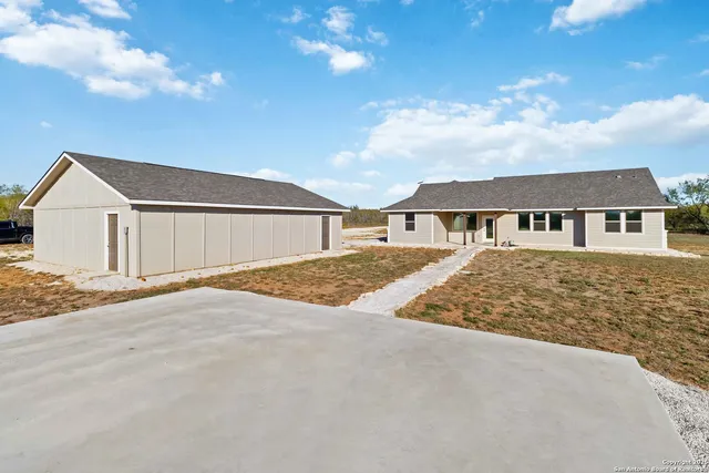 front view of a house with a dry yard