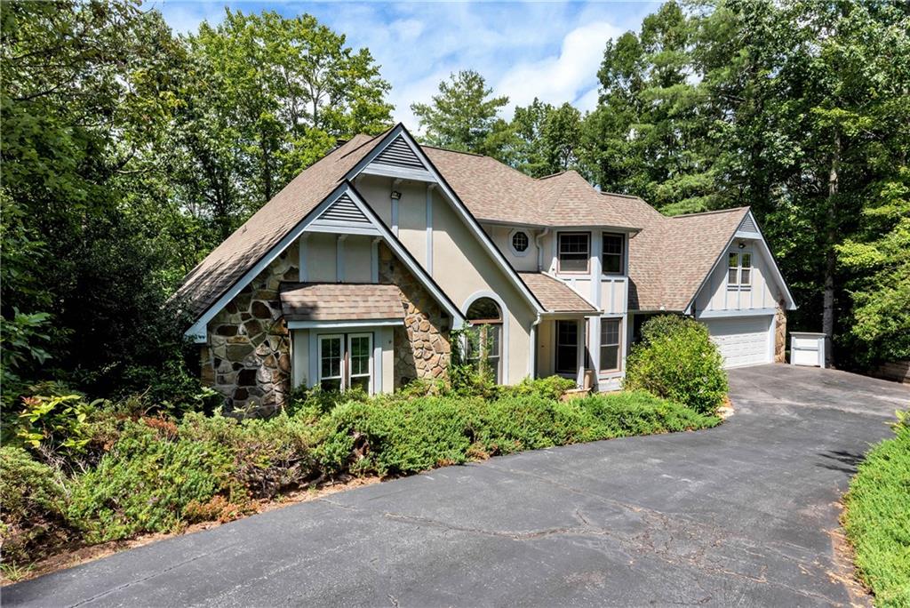 276 Zeppelin Strasse Helen, GA 30545 - Photo 1 of 60 a front view of a house with a yard