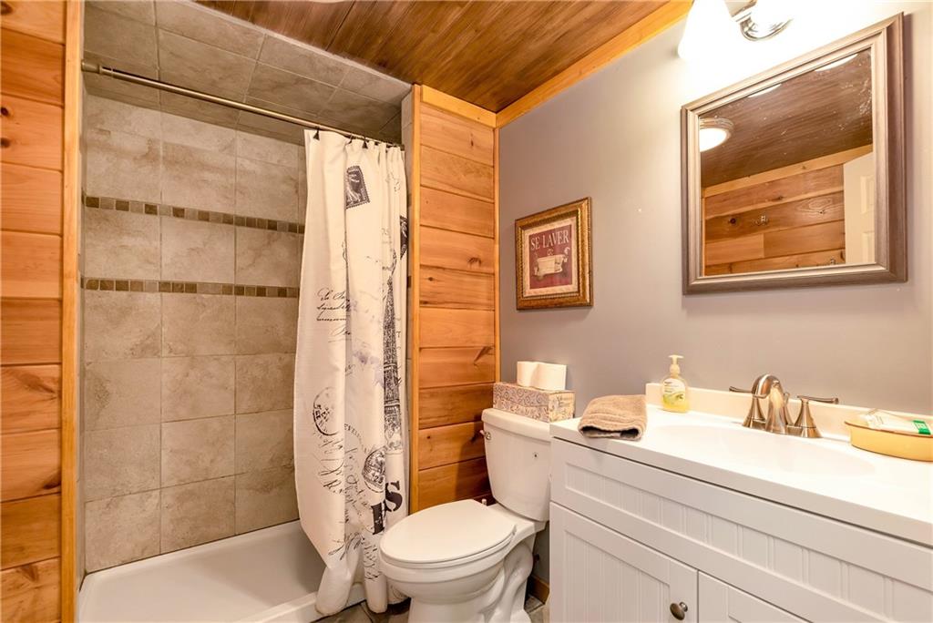 276 Zeppelin Strasse Helen, GA 30545 - Photo 41 of 60 a bathroom with a sink a toilet and shower