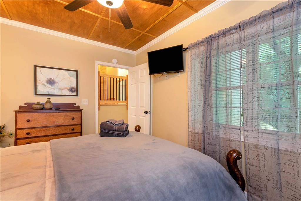 276 Zeppelin Strasse Helen, GA 30545 - Photo 43 of 60 a bedroom with a bed and wooden floor