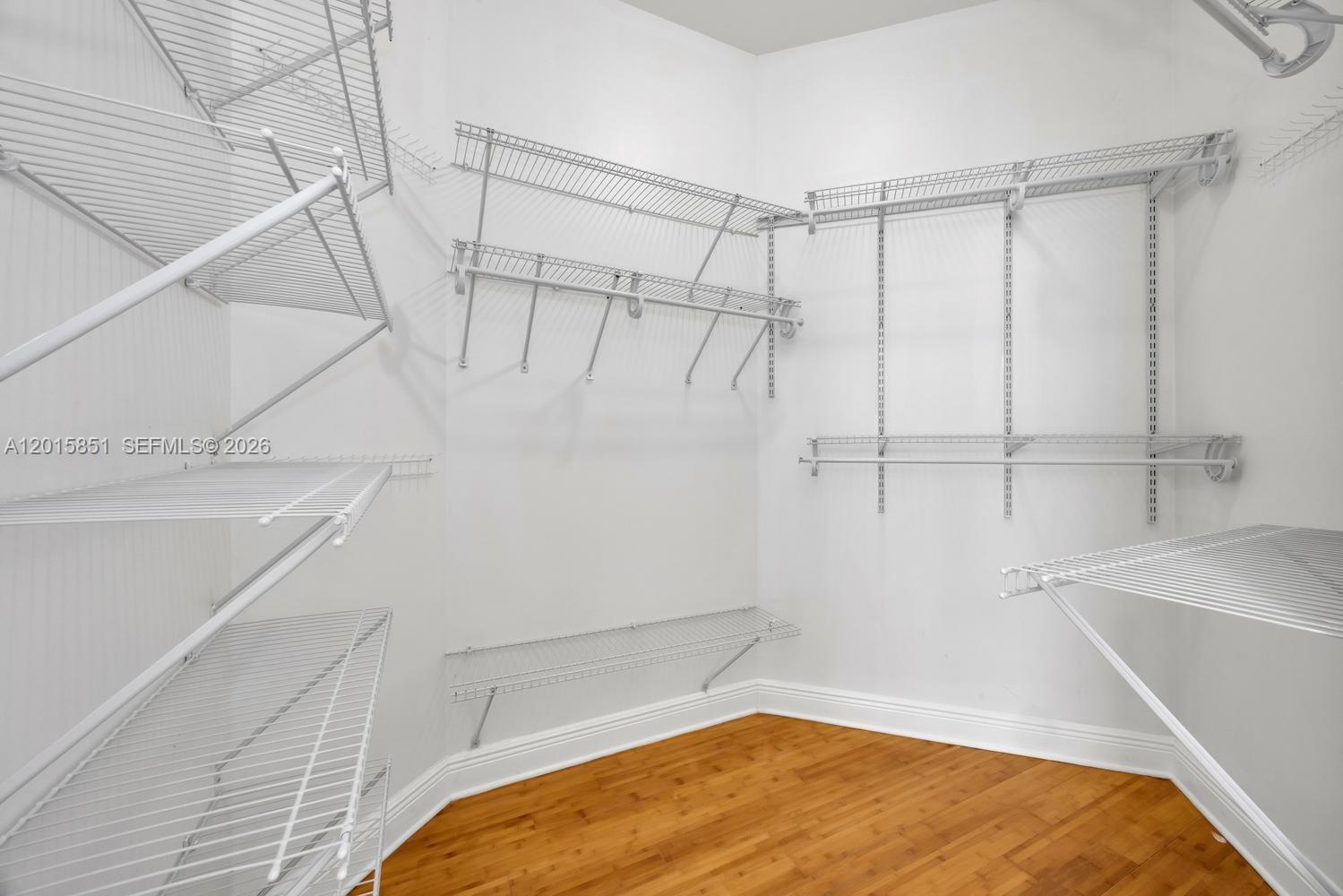 7275 Southwest 90th Street, Unit C719 Miami, FL 33156 - Photo 15 of 25 a view of a room with racks on the wall