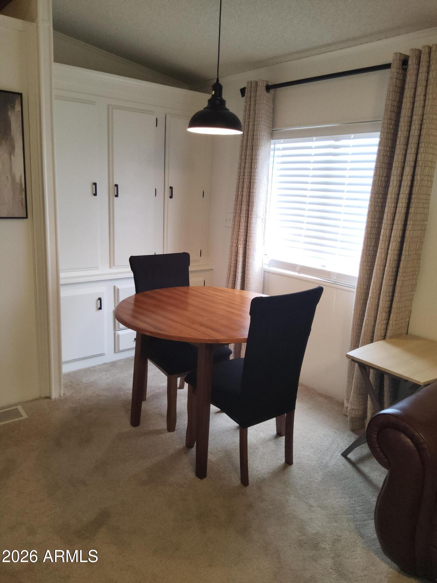 2015 South Wickiup Road, Unit 28 Apache Junction, AZ 85119 - Photo 11 of 12 Dining room1