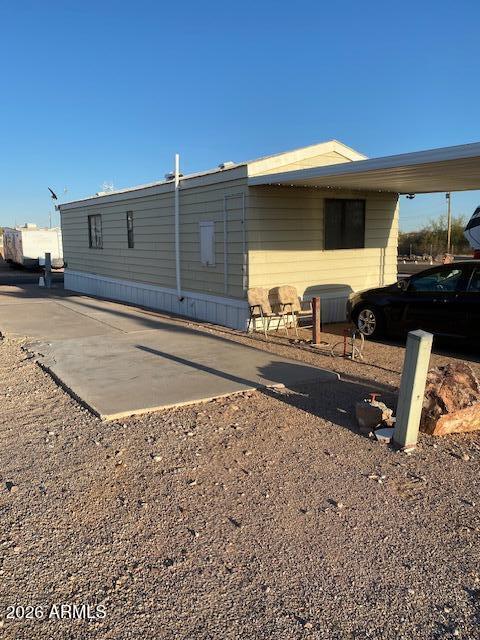 2015 South Wickiup Road, Unit 28 Apache Junction, AZ 85119 - Photo 3 of 5 a backyard of a house with barbeque oven