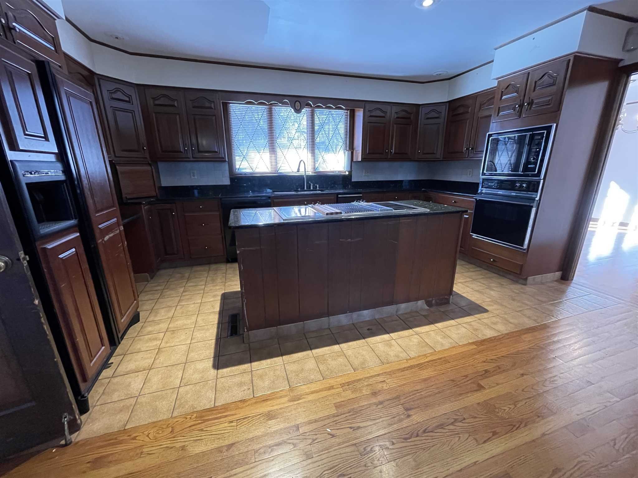 50 Allen Road Salt Point, NY 12578 - Photo 15 of 38 a view of kitchen with cabinets and wooden floor