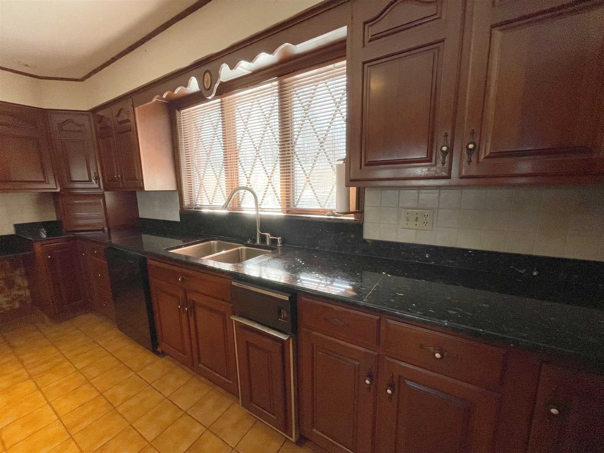 50 Allen Road Salt Point, NY 12578 - Photo 16 of 38 a kitchen with granite countertop a sink and a stove