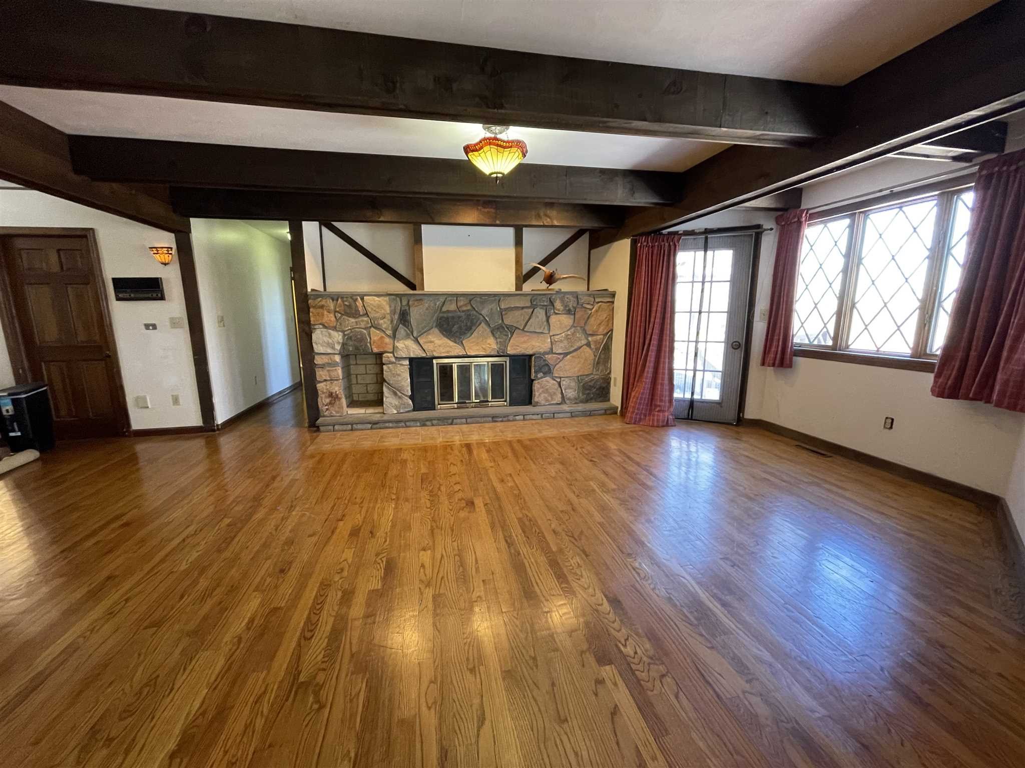 50 Allen Road Salt Point, NY 12578 - Photo 18 of 38 a view of empty room with wooden floor and fan