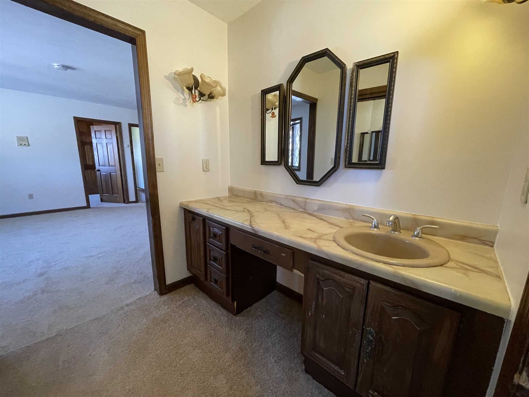 50 Allen Road Salt Point, NY 12578 - Photo 27 of 38 a bathroom with a granite countertop sink and a mirror