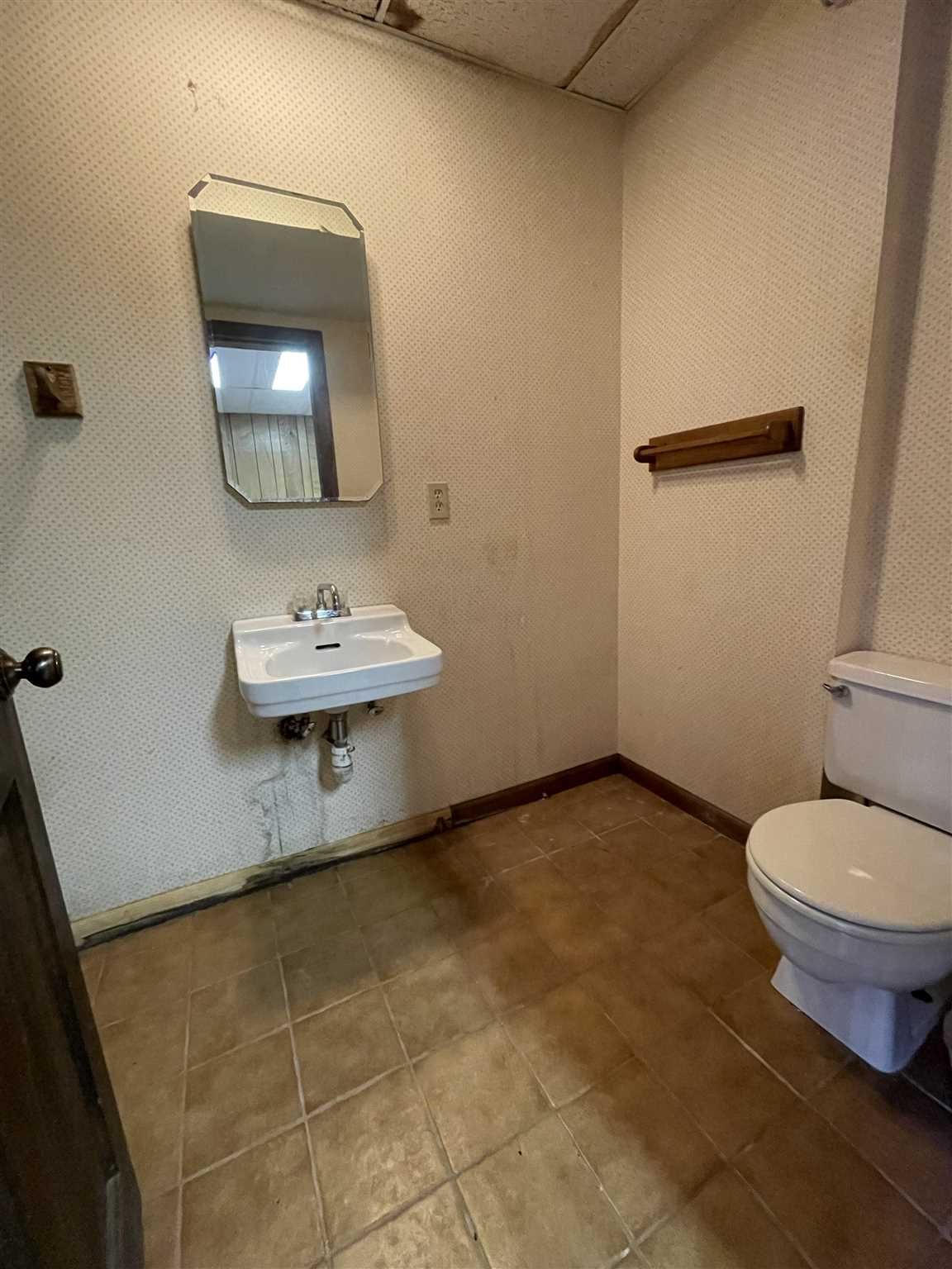50 Allen Road Salt Point, NY 12578 - Photo 34 of 38 a bathroom with a toilet sink and mirror
