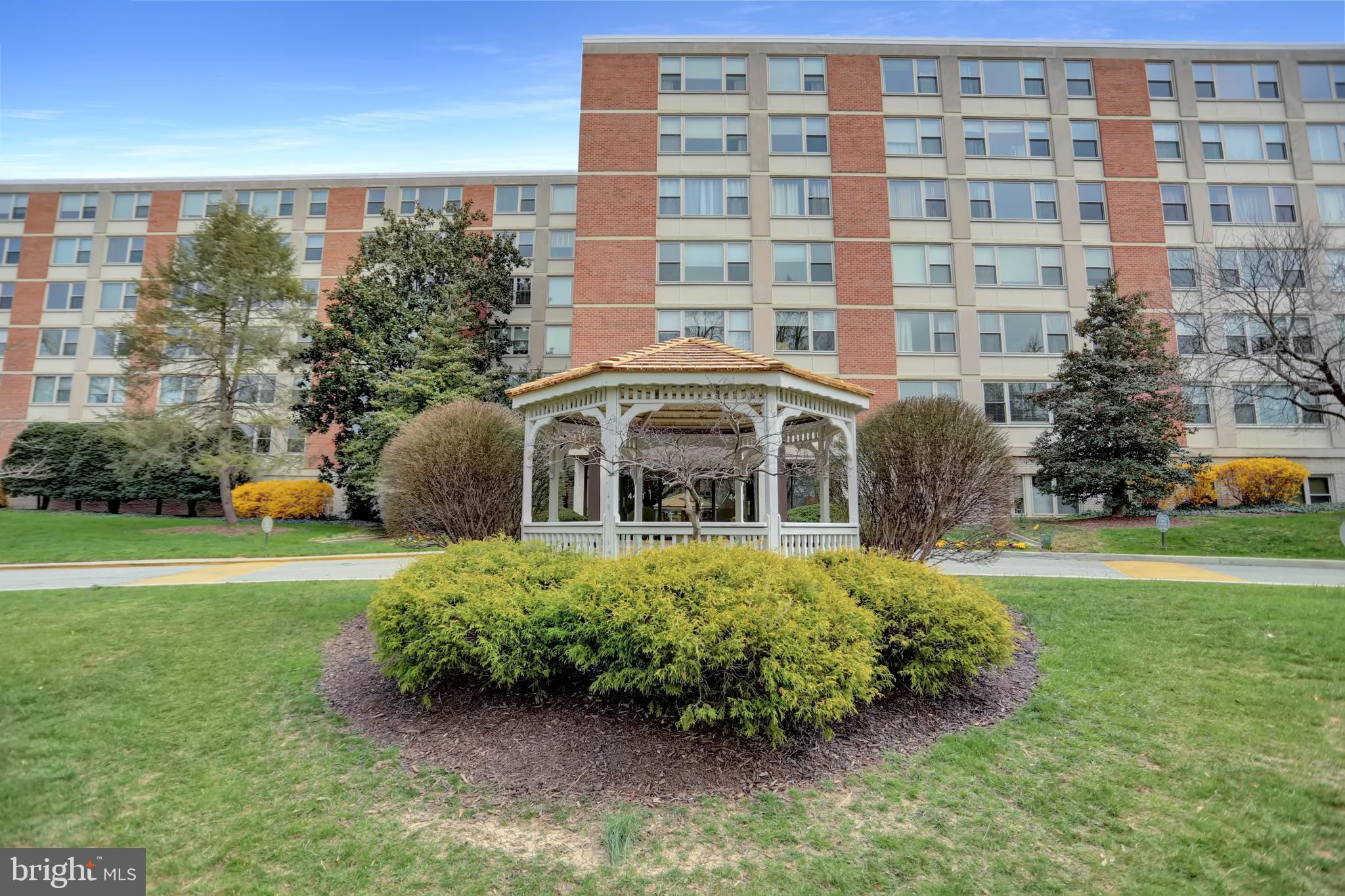 4401 Roland Avenue, Unit 304 Baltimore, MD 21210 - Photo 1 of 50 a front view of a building with garden