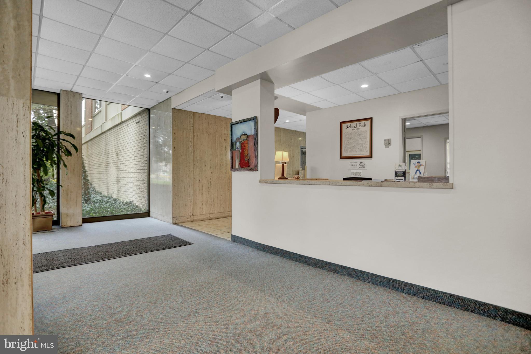 4401 Roland Avenue, Unit 304 Baltimore, MD 21210 - Photo 30 of 50 a big room with closet and a living room