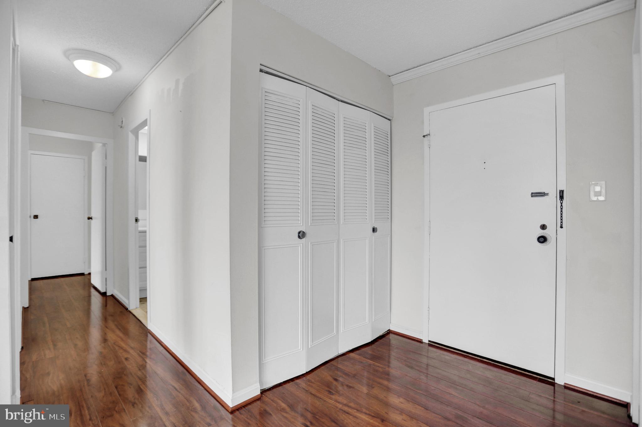 4401 Roland Avenue, Unit 304 Baltimore, MD 21210 - Photo 3 of 50 a view of an empty room with wooden floor