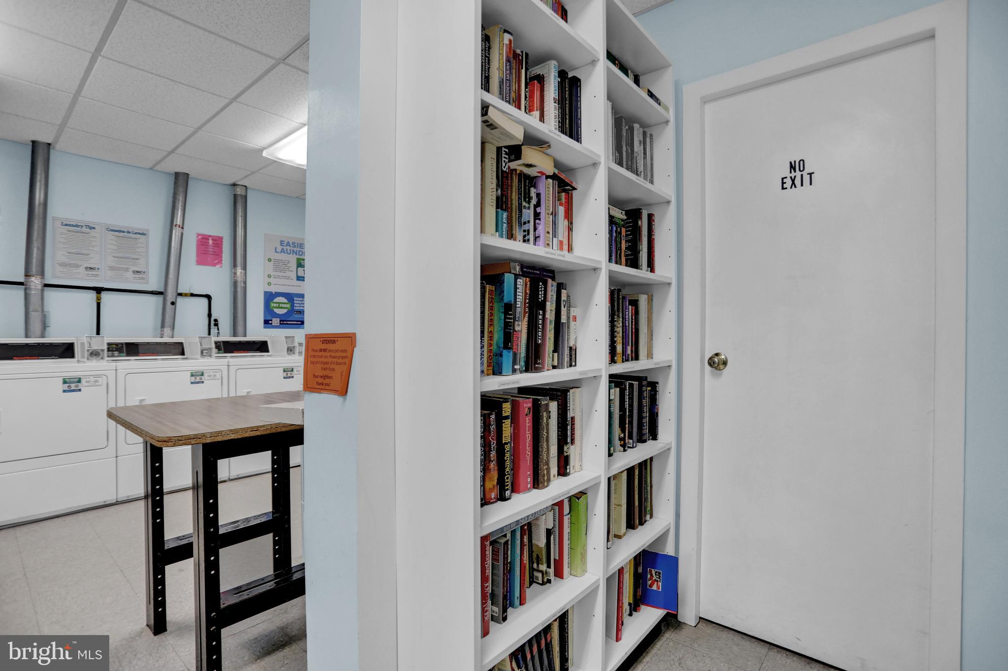 4401 Roland Avenue, Unit 304 Baltimore, MD 21210 - Photo 33 of 50 a room with a book shelf and a book shelf
