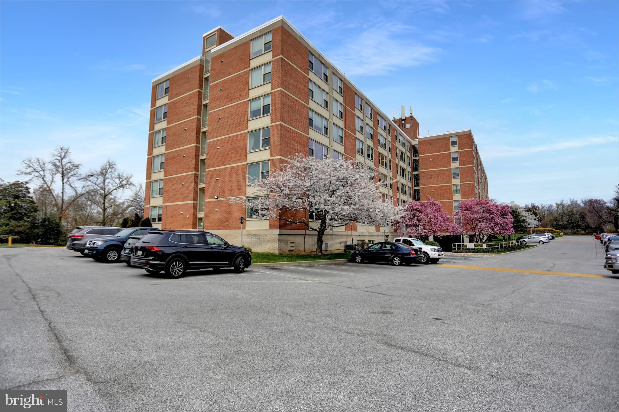 4401 Roland Avenue, Unit 304 Baltimore, MD 21210 - Photo 45 of 50 a car parked in front of a building