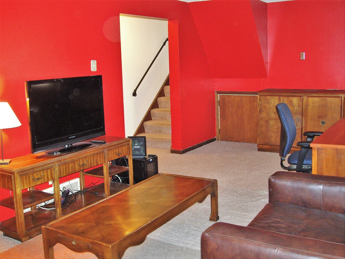 1102 Normal Road DeKalb, IL 60115 - Photo 11 of 22 a living room with furniture and a flat screen tv