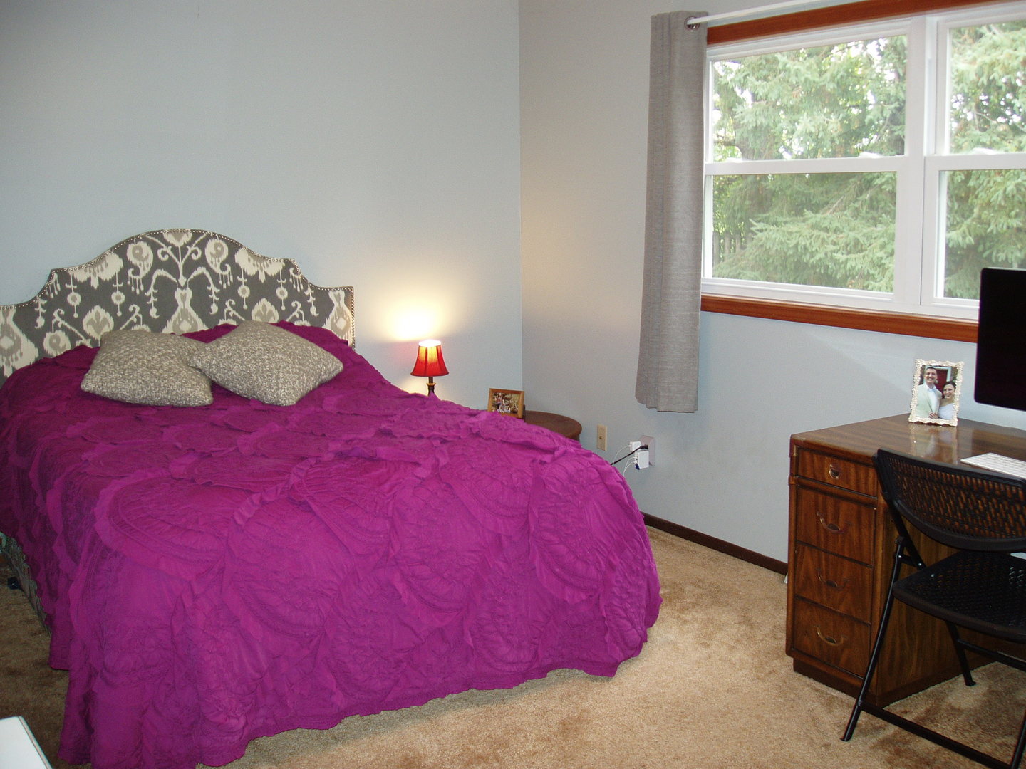 1102 Normal Road DeKalb, IL 60115 - Photo 13 of 22 a bedroom with a bed and a window
