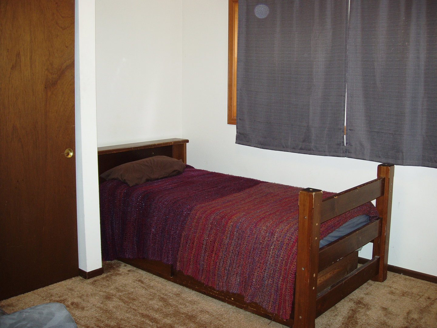 1102 Normal Road DeKalb, IL 60115 - Photo 15 of 22 a bedroom with a bed and a dresser