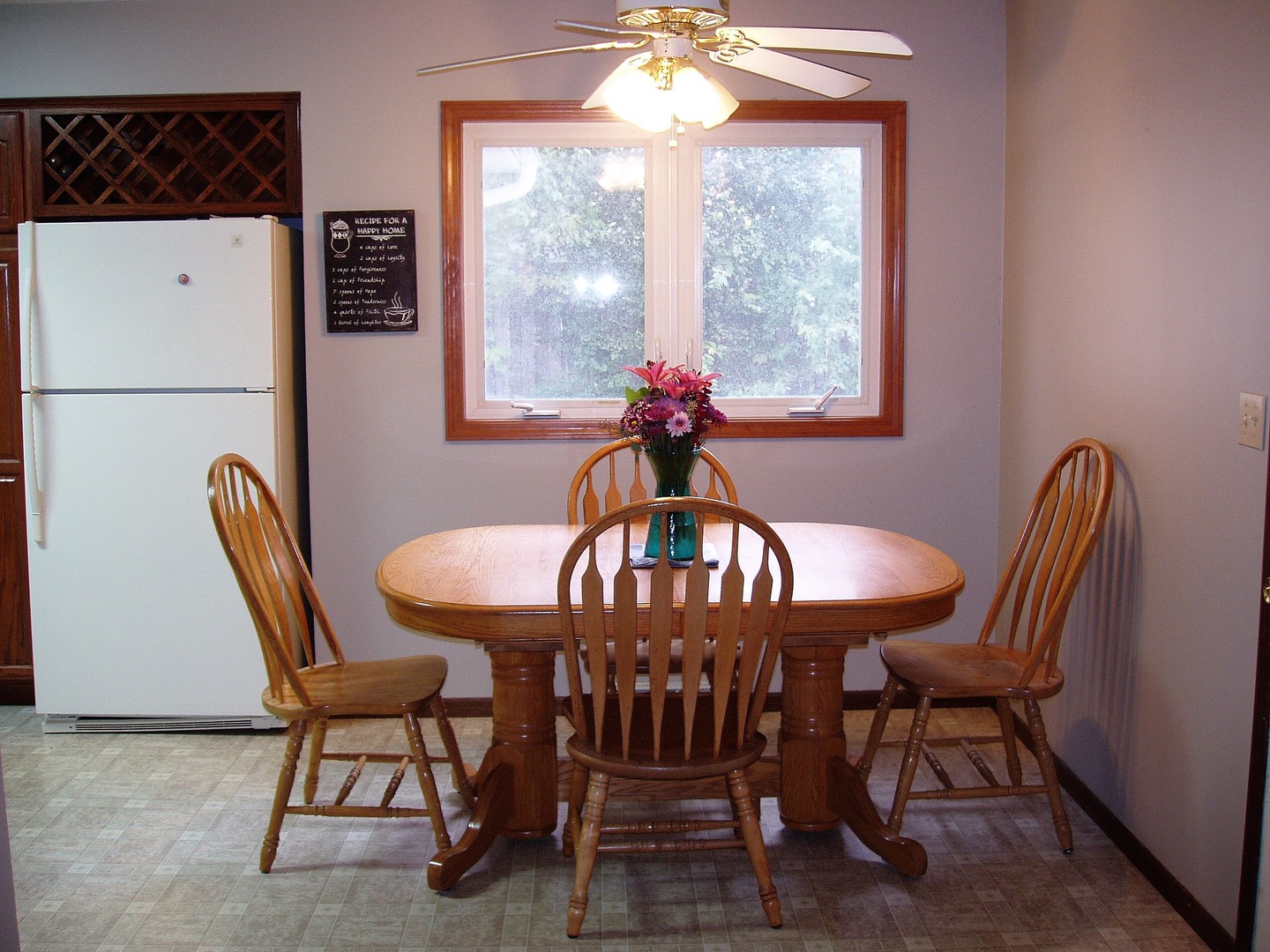 1102 Normal Road DeKalb, IL 60115 - Photo 5 of 22 a view of a dining room with furniture window and outside view