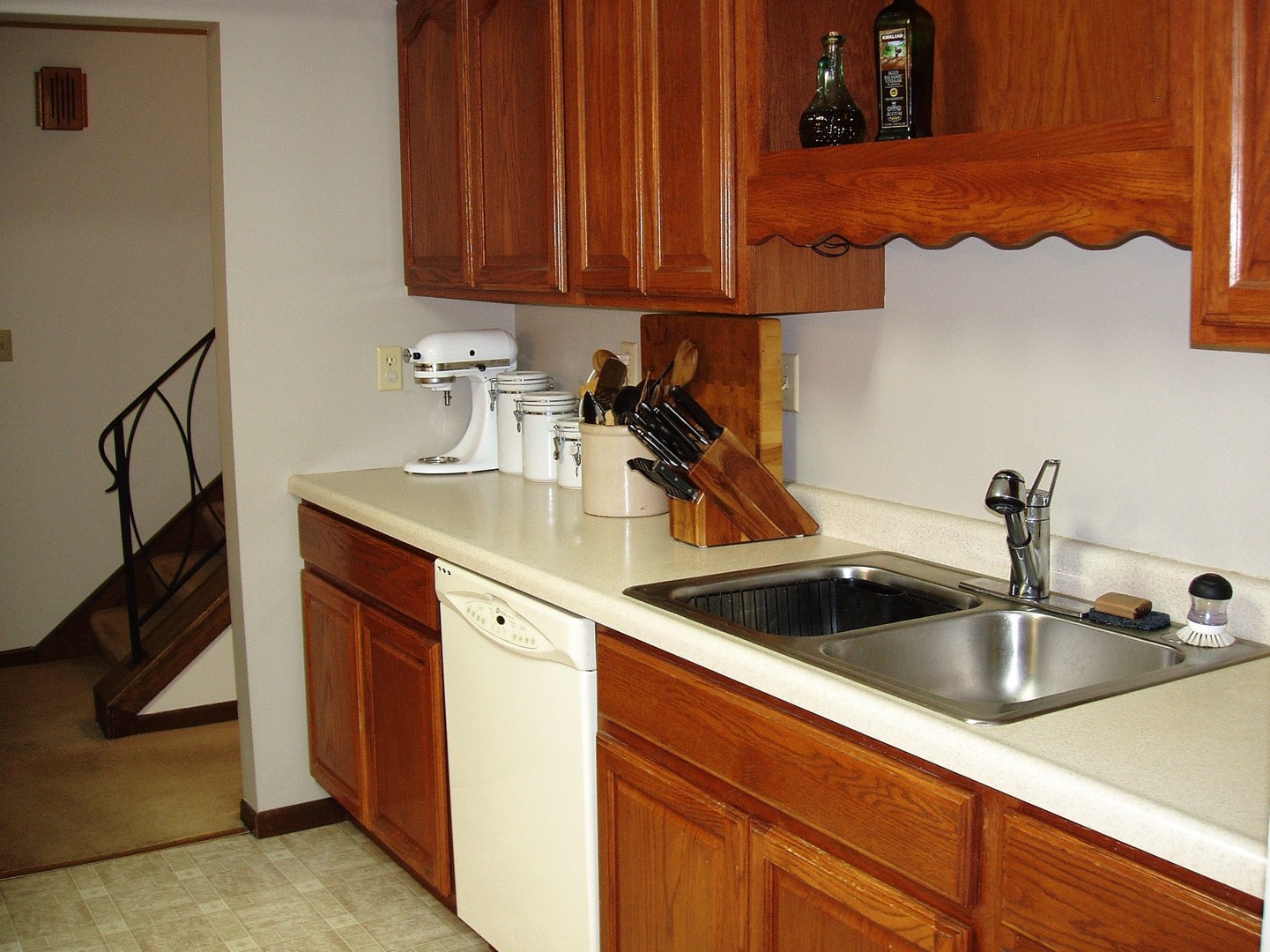1102 Normal Road DeKalb, IL 60115 - Photo 6 of 22 a kitchen with a sink and cabinets