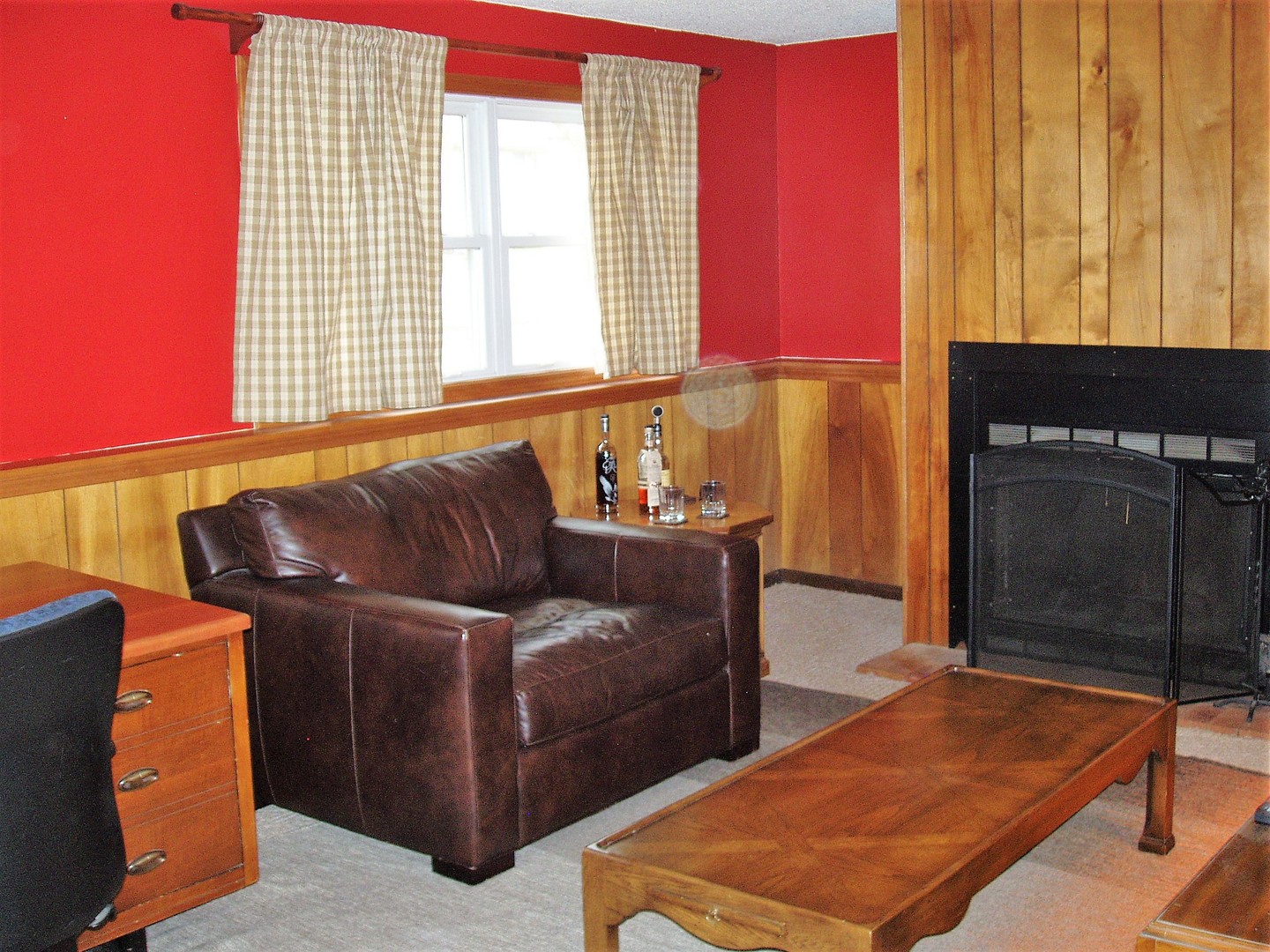1102 Normal Road DeKalb, IL 60115 - Photo 10 of 22 a living room with furniture and a gate