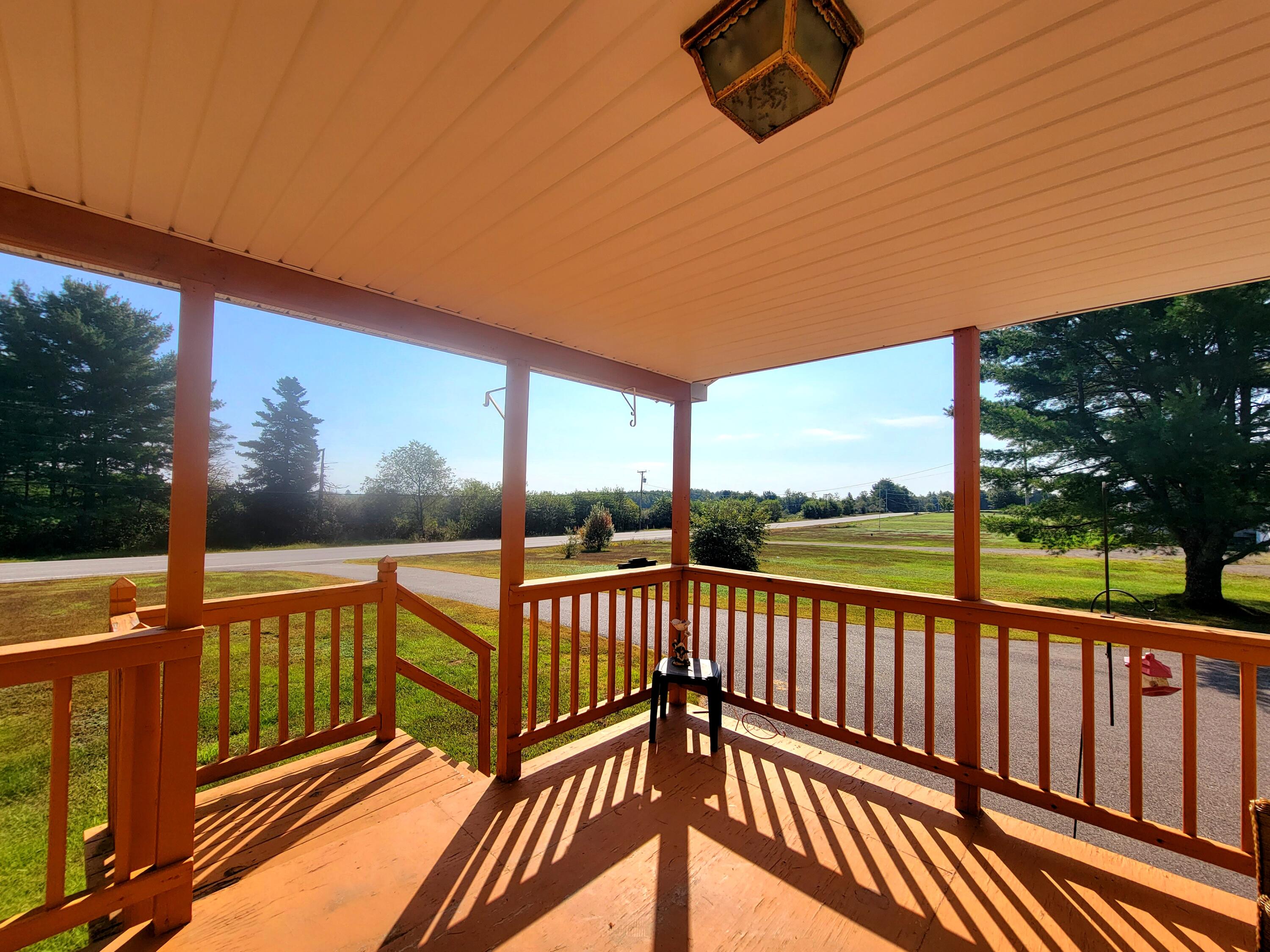 5416 Bennoch Road Lagrange, ME 04453 - Photo 9 of 32 Covered Front Porch